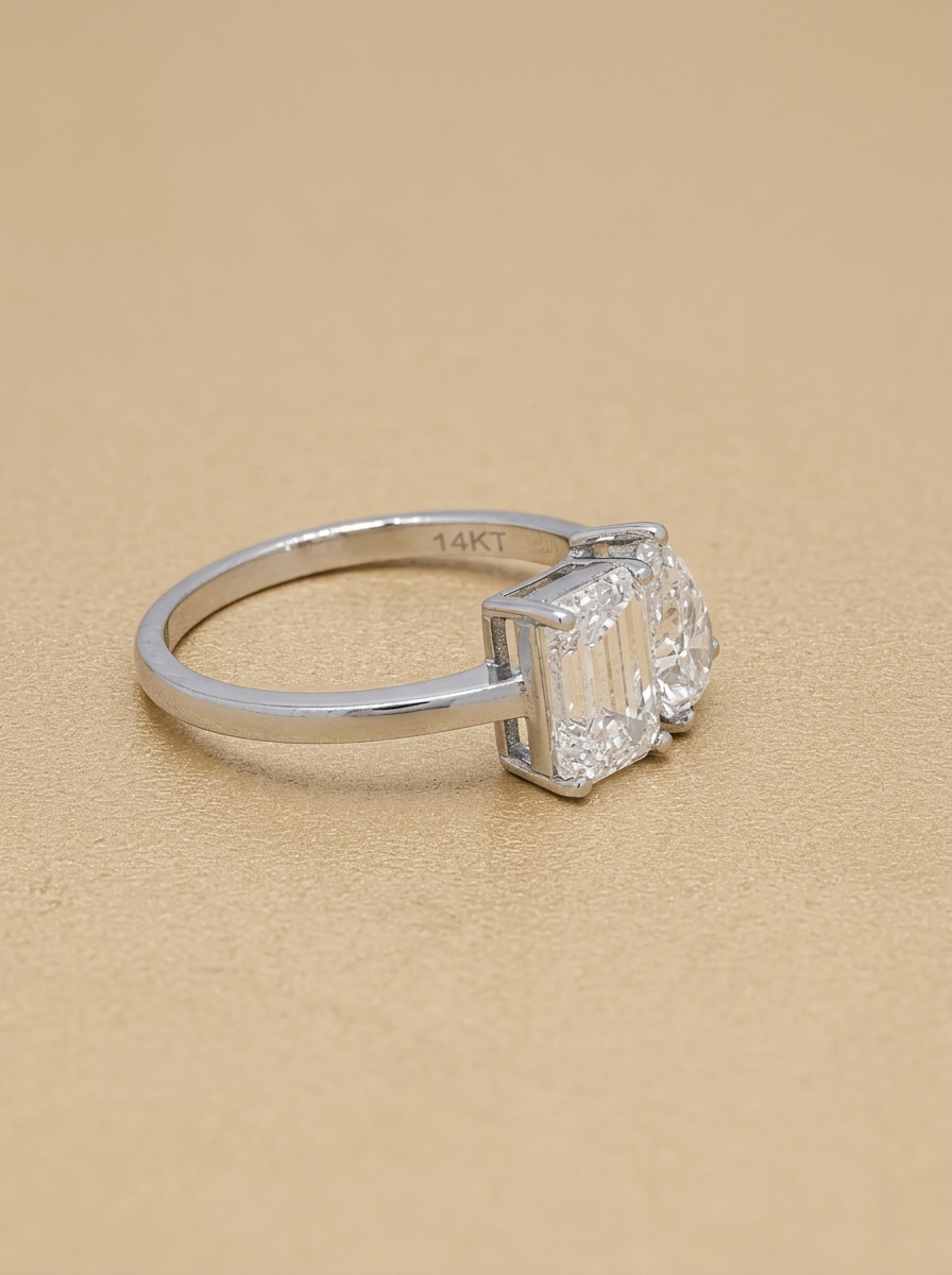 THE OBSESSION - White Gold Emerald & Pear Diamond Toi et Moi Ring