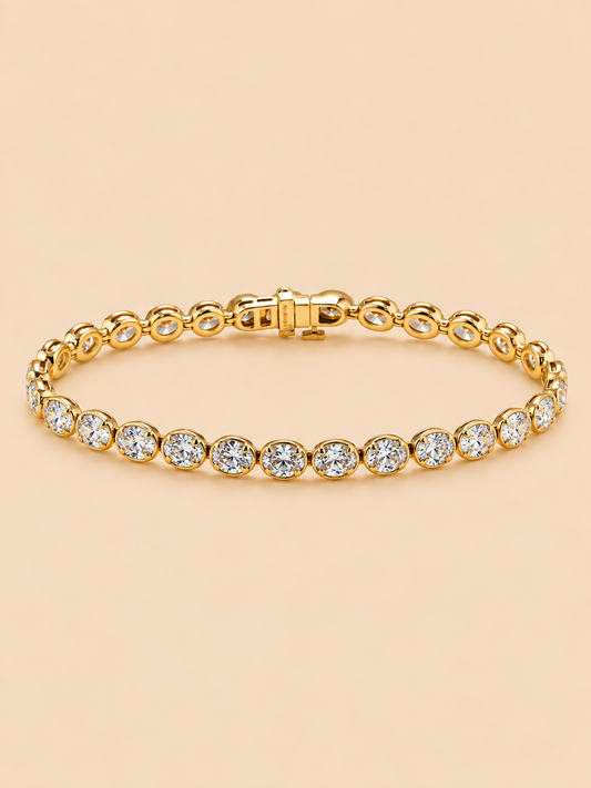 THE UNWRITTEN - Yellow Gold Lab-Grown Oval Diamond Bezel Tennis Bracelet