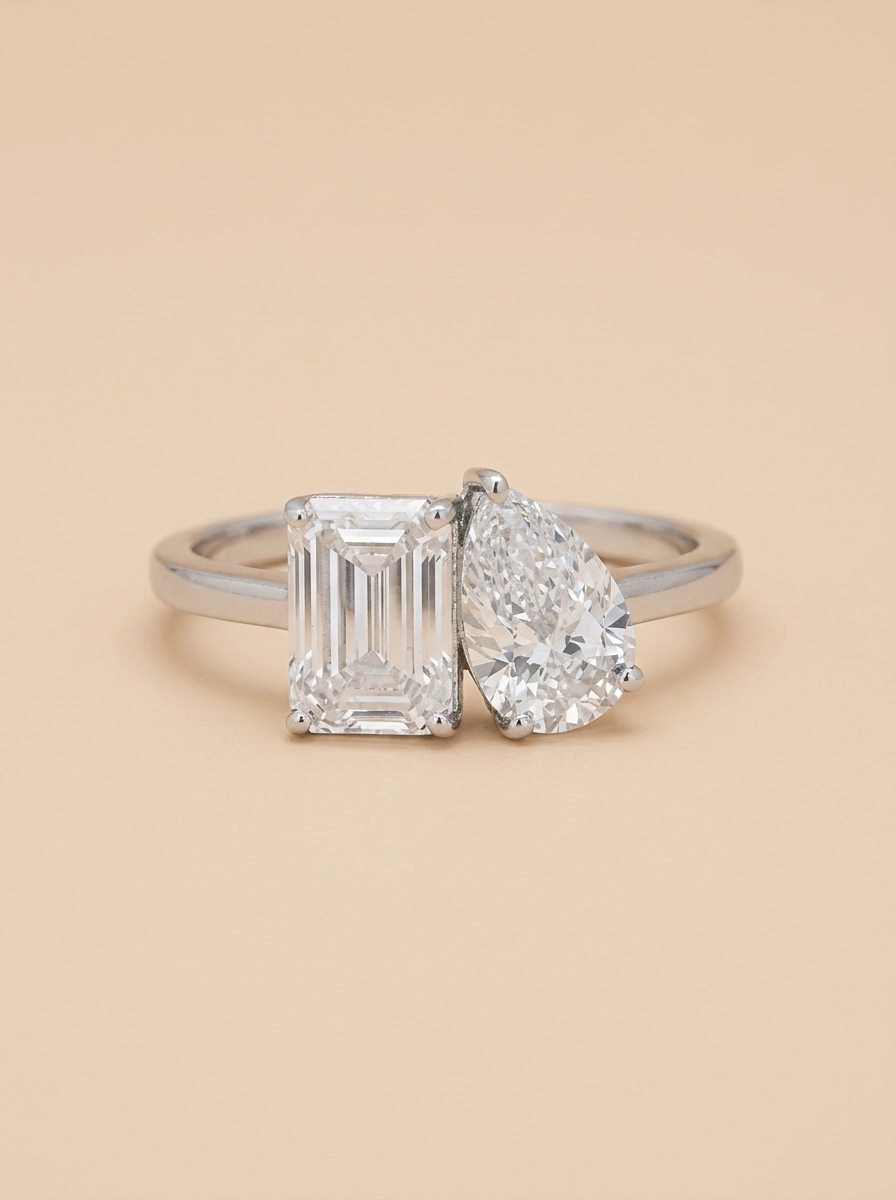 THE OBSESSION - White Gold Emerald & Pear Diamond Toi et Moi Ring