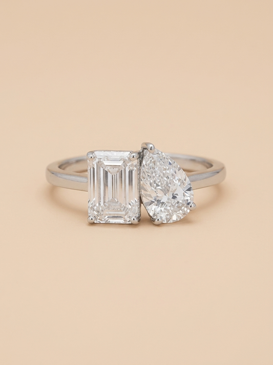 THE OBSESSION - White Gold Emerald & Pear Diamond Toi et Moi Ring
